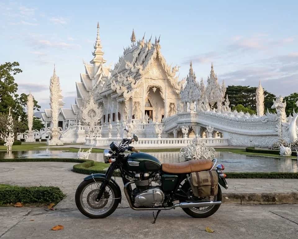 Triumph cruiser motorcycle at the White Temple (Wat Rong Khun) in Chiang Rai, Thailand: Byklo motorbike rental