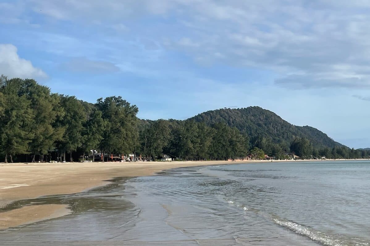 koh lanta beach viewing ocean and mountains in background