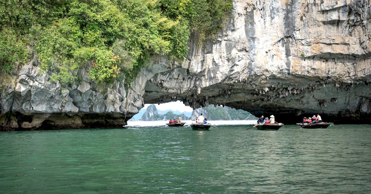 Explore the stunning limestone caves and emerald waters of Ha Long Bay.