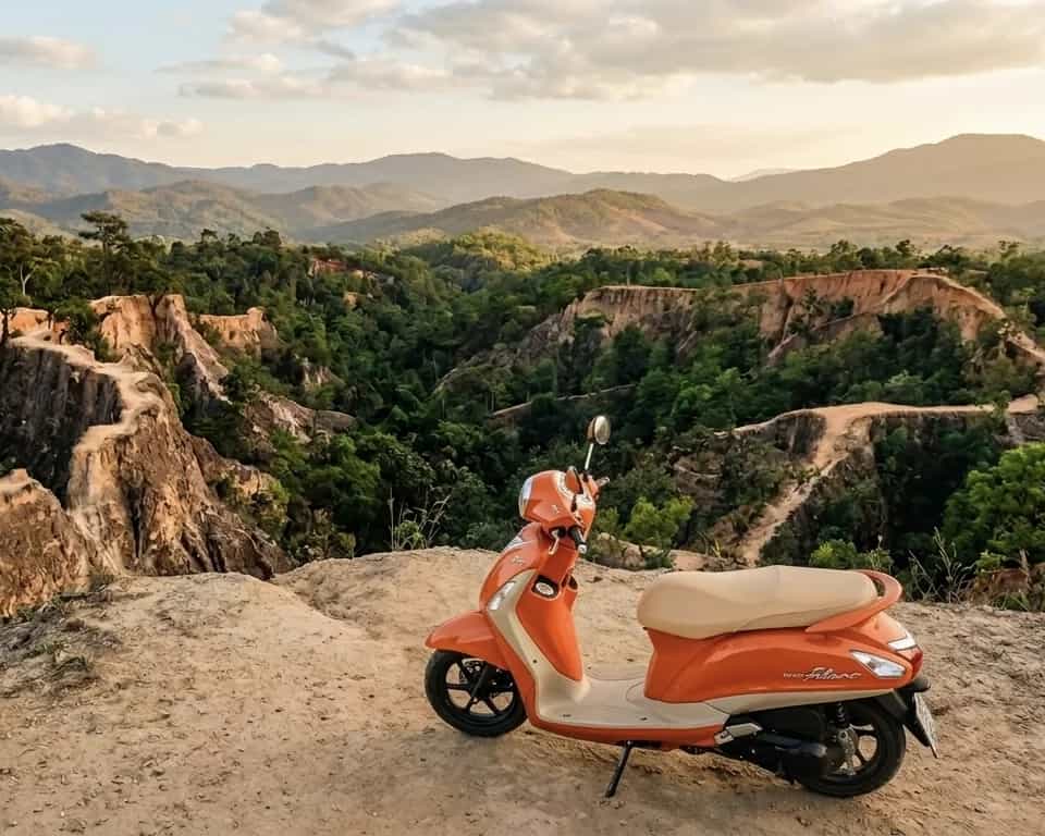 Yamaha Filano scooter at the Pai Canyon viewpoint in northern Thailand: Byklo scooter rental