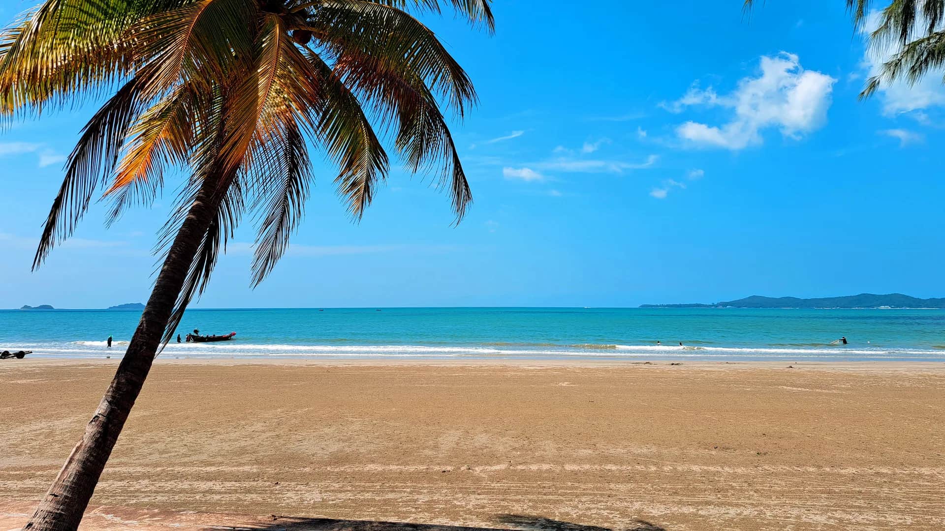 Khao Laem Ya cape at golden hour with Koh Samet on the horizon in Rayong, Thailand